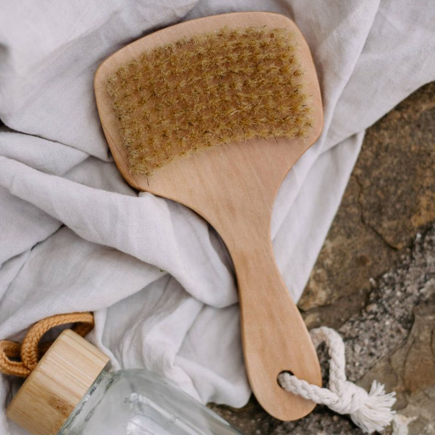 Bath Brush from above on white cloth background