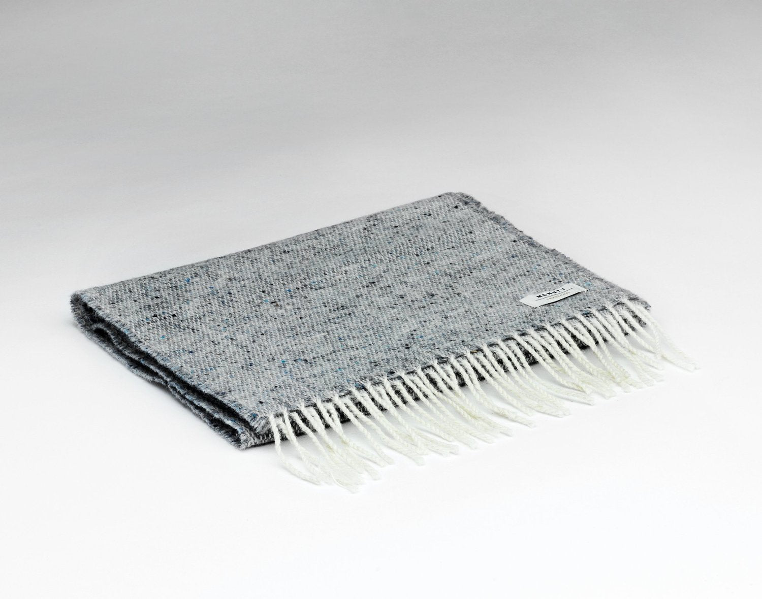 McNutt Donegal lambswool tweed scarf in Donkey Grey folded
